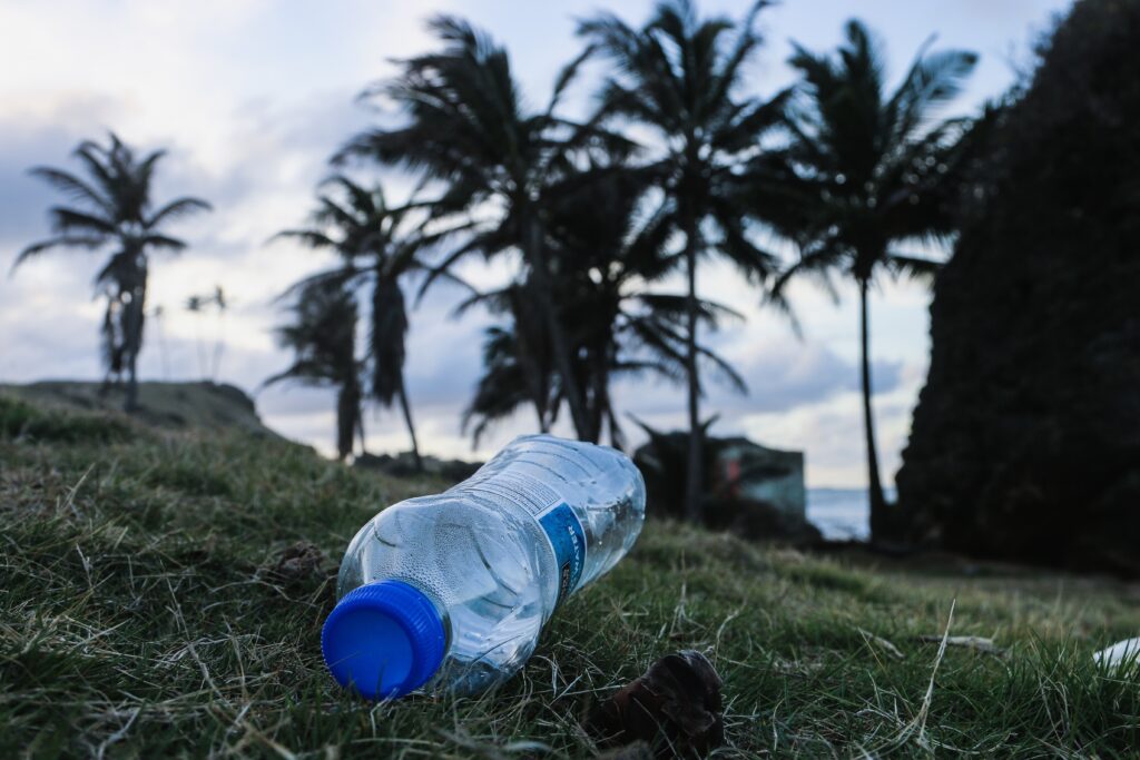 plastic bottle littered on a hillside