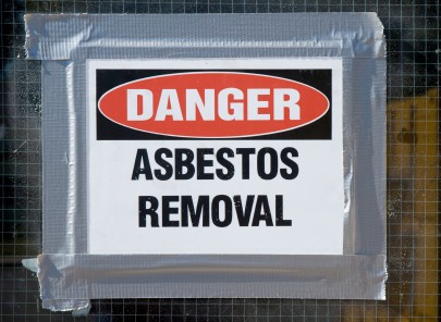 Asbestos removal - danger sign taped to door - Woodford Recycling