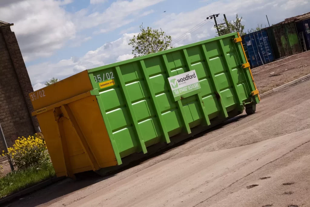 Large green skip used for commercial & domestic waste | Woodford Recycling